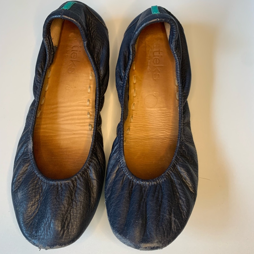 Navy Tieks, size 8.